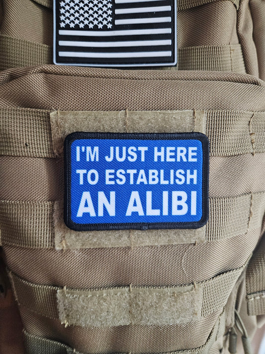 I'm just here to establish an alibi  2"x3"  removable morale patch with hook and loop backing