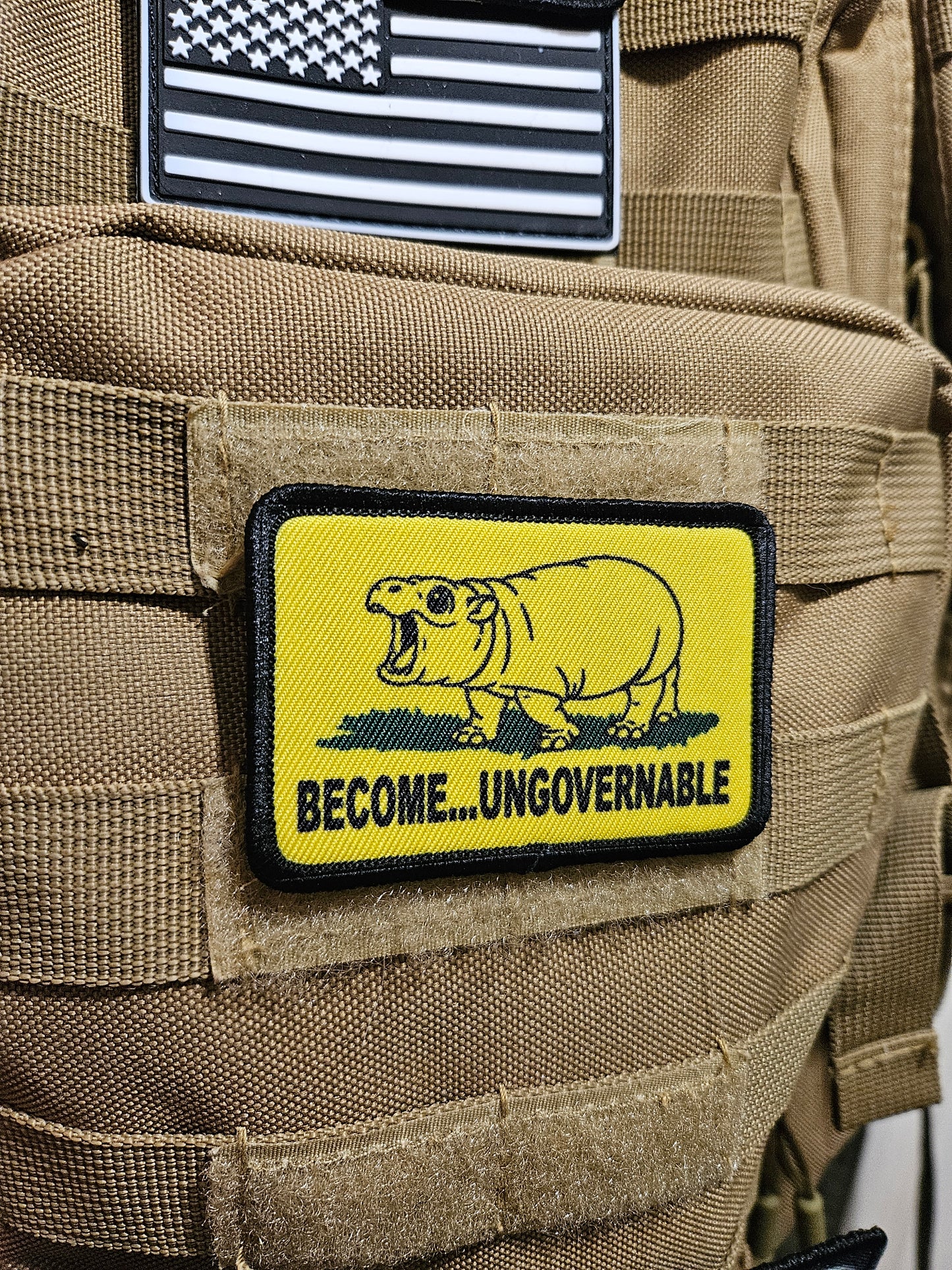 Become ungovernable baby hippo meme 2"x3" morale patch with hook and loop backing line art version