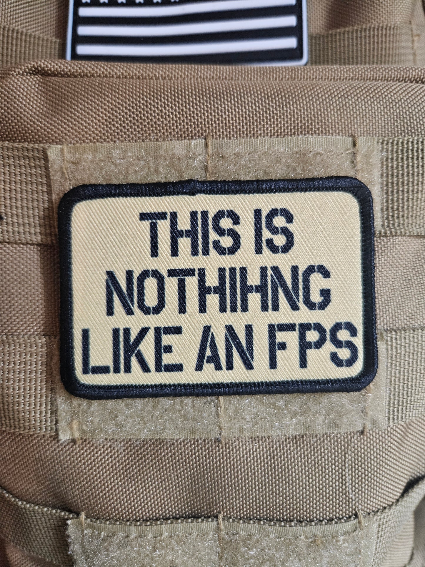 This is nothing like a first person shooter military meme 2"x3" removable morale patch with hook and loop backing